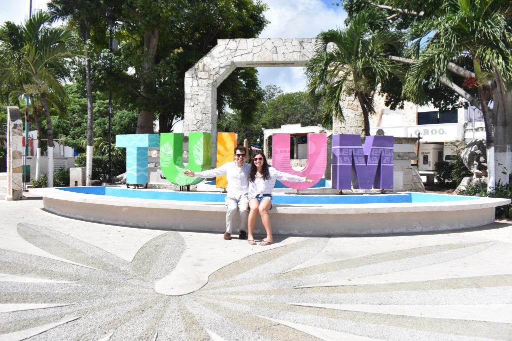 In front of the Tulum Sign